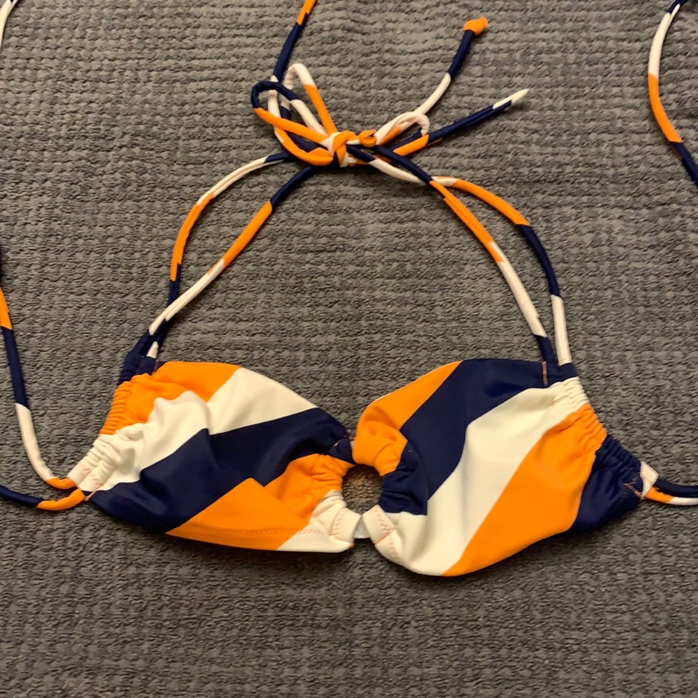 Bikini top by Victoria’s Secret